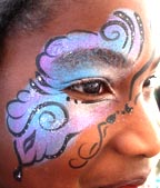 face paint butterfly on dark skin