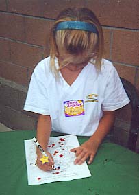 a girl coloring Star